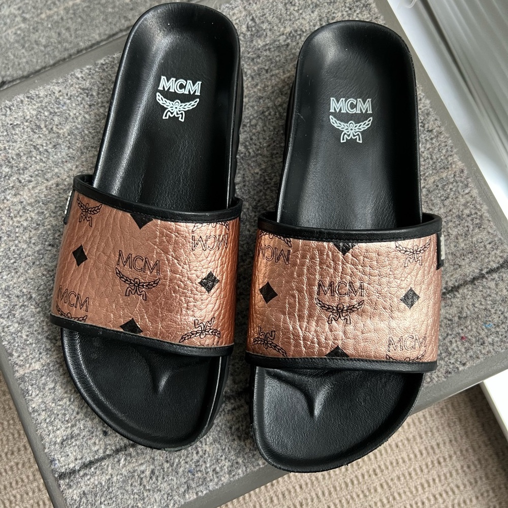 MCM Black and Copper Slide Sandals